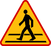 Znak drogowy ostrzegający o przejściu dla pieszych.